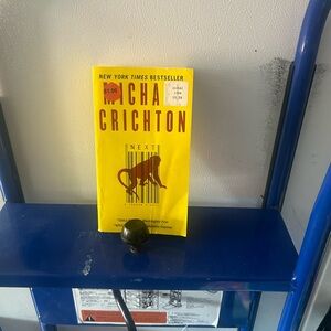 Yellow 'Next' Book by Michael Crichton